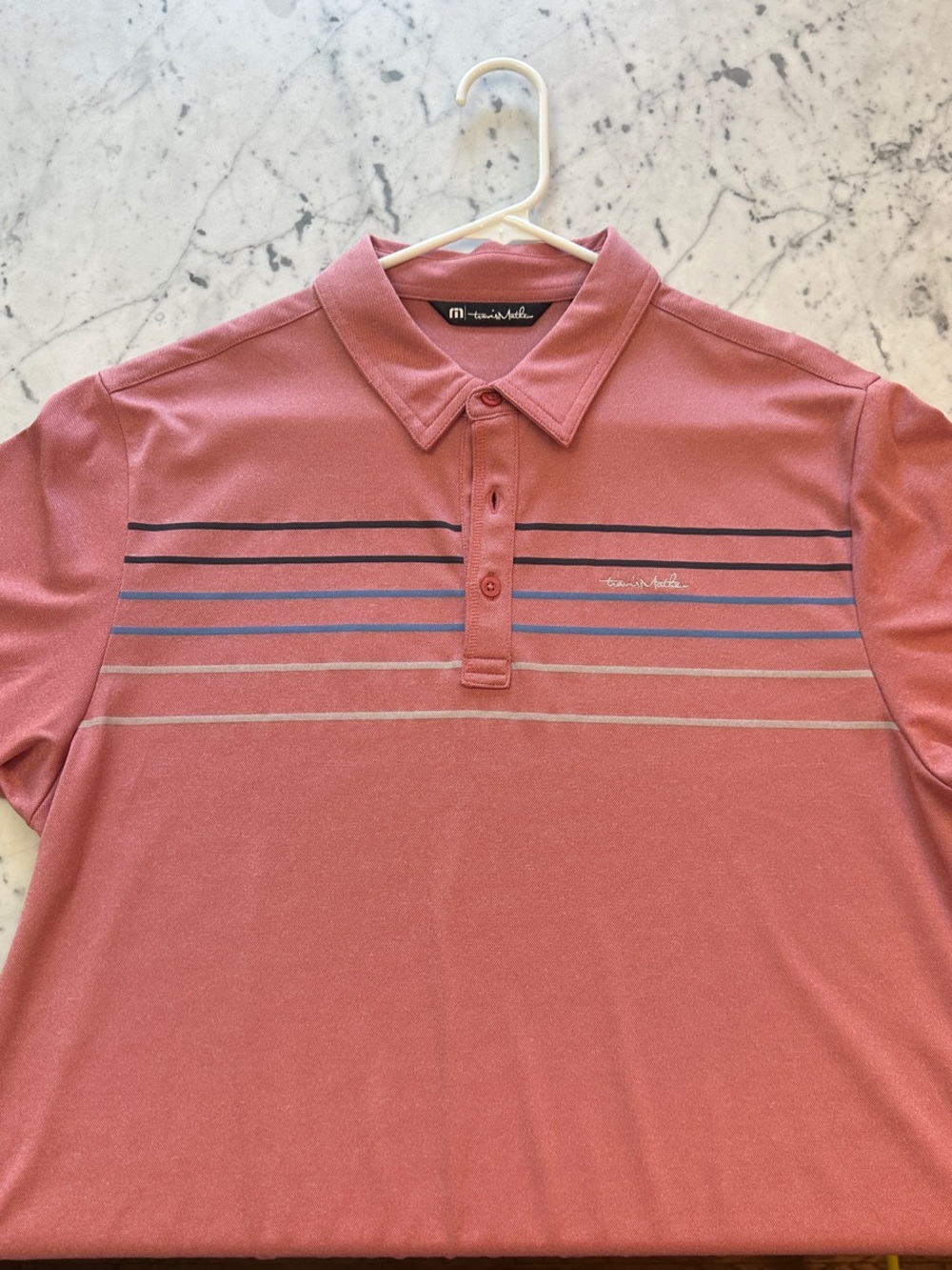 TravisMathew Men's Coral Polo with Blue and Gray Stripes